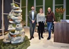 The team from the carpet company Longbarn, from left to right: Jasper Kempers, Judith de Bruijn, and Robert Apeldoorn. The artwork on the left, radiating 'the basis for all products is nature,' was constantly photographed by visitors at imm.