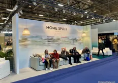 Visitors take a break on the sofas from the French company Home Spirit.
