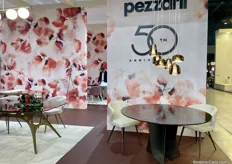 Pezzani celebrated their 50th anniversary with a beautiful new table model featuring a uniquely tumbled tabletop.