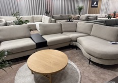 Sassy Design's stand filled with couches of different shapes and sizes.