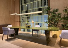 Here is the extra-long Frank dining table by Robin Rizzini, paired with OPALE dining chairs by Patrick Jouin for Pedrali.