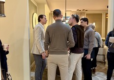 On the left, owner Frank Versteeg talking with visitors.