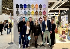The PresentTime team with the colorfull, well-known clocks from the brand.