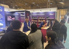 Craig Heart, sales director at Emmiera Group, busy with his colleagues assisting visitors at the stand.