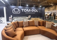 Tom-Pol's eye catcher on the stand with refreshing curvy edges, with the use of soft cushions as the base.
