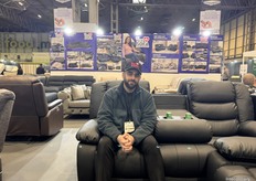 Hamza Baig, Accounts Manager, sitting on My New Sofa’s first-ever developed sofa model.