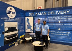 Jonathan Sullivan, Customer Service Director, with his colleague, sharing insights at the stand on why JBS 2-man Delivery is a trusted name in the furniture industry.