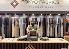 Sukh Sandu (co-owner) showcasing a hands-on model with the ability to switch fabrics instantly, giving visitors a real sense of how their fabrics would appear on furniture.