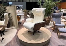 The Vesta modular couch by Furninova combines sleek oak wood with luxurious sheepskin for a perfect blend of style and comfort.