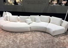 As part of the Actona Group, Sits showcases its newest modular couch, defined by refined, flowing curves for a sleek finish.
