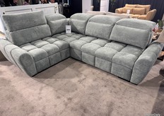Aurora couch, featuring a sleeping function, reclining headrests, and a distinctive bubble look, is gaining the attention it deserves by the visitors to the stand. Made by Sliding Wardrobes 4U, a brand by Arkos.