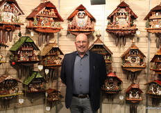 Christian Schwarz posed in front of Hönes’ hand-crafted cuckoo clocks, which feature 450 new designs each year.