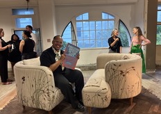 Our desk editor, Mikyall Harris, who works remotely from South Africa at the Casamento stand during the opening night of Cape Town Furniture Week.