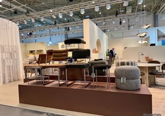 A look at the Unique Furniture booth, which highlights the trend of chrome bases.