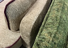 We still saw many thicker boucle fabrics, often in warm colors, as seen here at KINAS Meble.