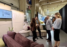 The KINAS Meble team engaging with visitors.