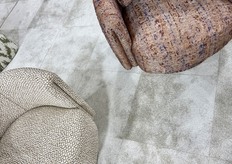 We continued to see many boucle fabrics, this time in warmer shades.