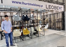 Greg from Leobert, who imports chairs, displayed them here at the exhibition.