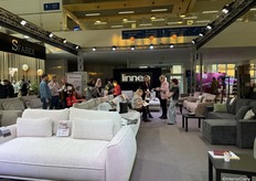 Inside Linneo’s booth, where they displayed various furniture pieces.