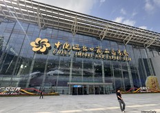 Signage for the China Import and Export Fair, held in the same building as CIFF, with a person included for scale, yet this wasn’t even the entrance to the fairgrounds.