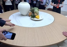 A traditional yet modern version of the Lazy Susan, the well-known Chinese table with a rotating center used to share food during dinner.