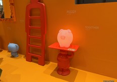 SLIDE’s colorful displays featuring intriguing designs and warm tones.