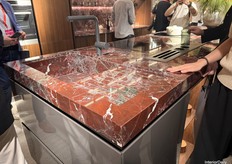 HC28 Maison’s use of marble integrated into the kitchen area.