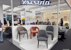 YATSUNN’s stand, showcasing their newest designs for both chairs and couches.