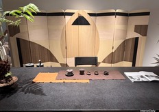 A long steel-painted table by JICHI Furniture, styled in natural colour tones.