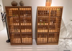 Crafted from real oak, this design uses transparency and light to elevate the display.