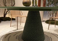 Woven from the table leg. Ikon Twist table by Pedrali.