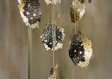 The golden finish is hammered, everything handcrafted in Portugal.