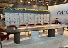 Extremely long office table by Carel Woodworks.