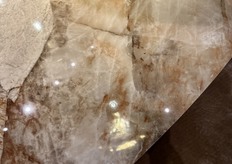 A warm orange glow ran through the tabletop.