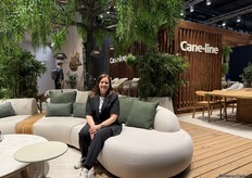 Sofie from Cane-Line on the outdoor sofa of the Danish brand.