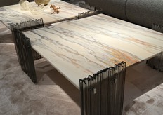 Many of the new products from Galotti & Radici feature glass, including these sides and legs of the coffee tables.