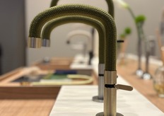 Unique faucet collection where the neck is wrapped in rope.