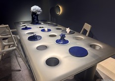 Zieta's non-practical table with holes across the base.