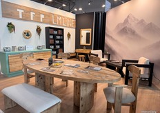 Solid wood was used in the round table and accompanying chairs, finished with Romanian fabrics at TFP's stand.