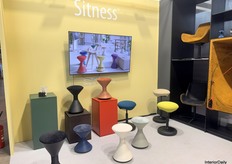 Sitness showcased chairs equipped with spring systems designed to gently bounce users while seated for a more active sitting experience.