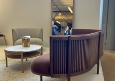 The Sideways Sofa is finished with walnut wood.