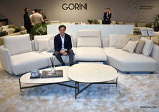 ... posing on a modular Italian sofa by Gorini, traditionally a classic furniture label that has been given a modern look and features, among other things, reclining functions.