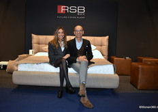 Stephan Moens of Profine Bedsystems, with daughter Liselotte, on an RSB bed: a, in his own blessing, 'revolutionary, 4-module adjustable box spring system for back, shoulders, pelvis and knees for a perfect sleeping position'