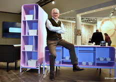 Tjilt Prins of Bijnen Meubel Group, sitting on the Cameleon (a completely new furniture concept designed by Axel Enthoven): winner of the Balthazar award 'Love at First Sight'.