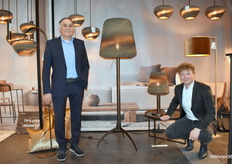 Director William Joosten (left) of lamp manufacturer Masterlight with Bob Beumers, posing at a new lamp collection made of cardboard, conceived in collaboration with the brand think paper.