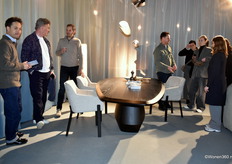 Pascal Zegers (right of centre) and Joost van Ede (3rd from left) of QLIV (Design Tales Agencies) talking to visitors.