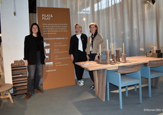 Annelies Pilat (left) with Marlies van der Werff and Carin Rijpstra of Pilat&Pilat, posing near dining table ROB (design from their own design studio, by Peter Tromop) and dining room bench MARE (Studio Slow), among others.