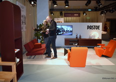 View inside Pastoe's showroom, with Jan Willem Huethorst in the middle, where it's all about clean lines and colourful minimalism.