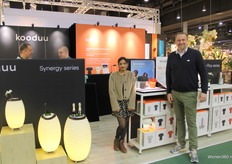Steven grinder and Roopa singh at Kooduu's booth next to the Synergy series.