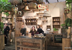 Be-Uniq's wood-filled stand, presented by Niko, Finly and Krista.